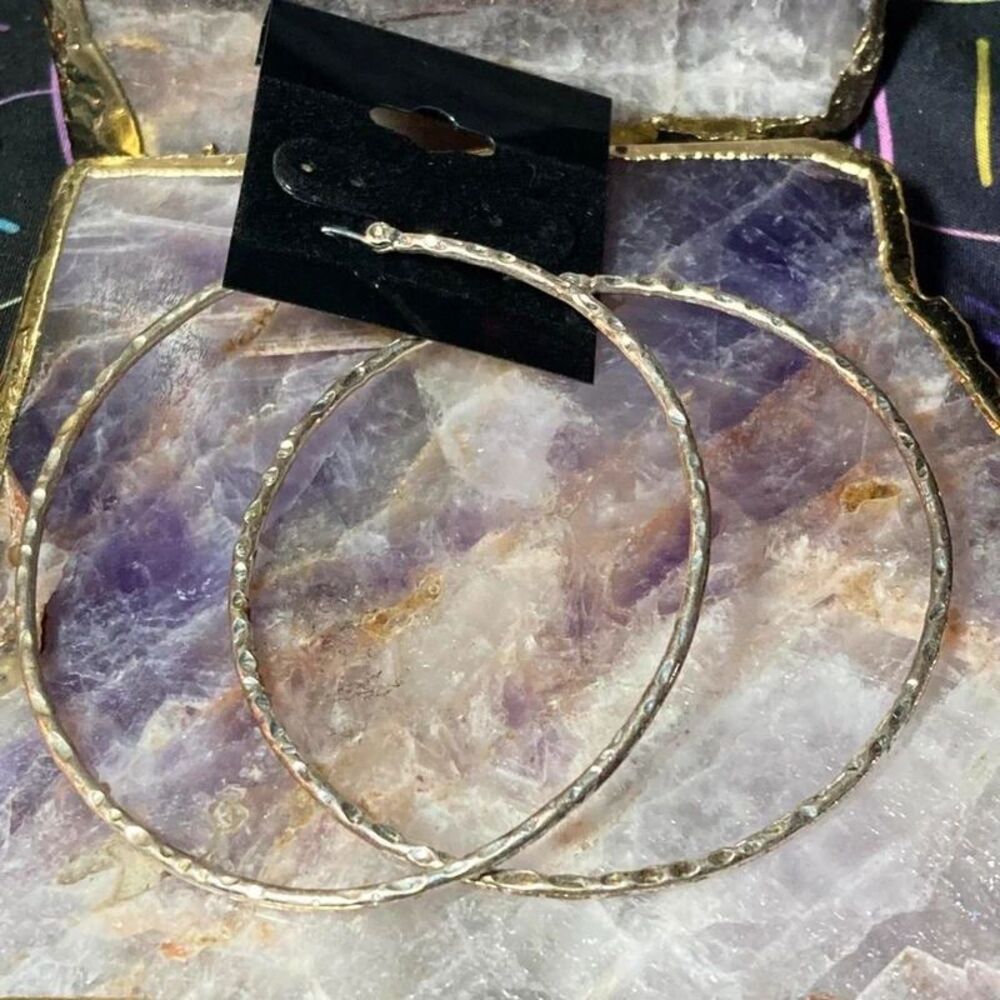 Large silvertone metal hoop earrings